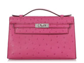 Hermes - rose tyrien Ostrich Kelly Pochette Palladium Hardware