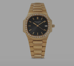 Patek philippe Nautilus yellow gold suze 35 mm
