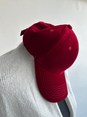 vest on a couch - velvet cap