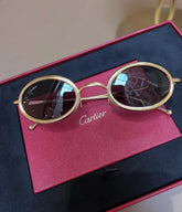 Cartier - Oval-frame gold-tone titanium sunglasses