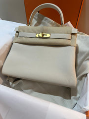 Hermes - kelly size 28 - Craie color - GHW - togo leather