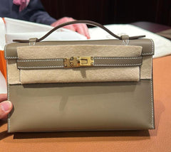 Hermes - Etoupe Swift Kelly Pochette Gold Hardware
