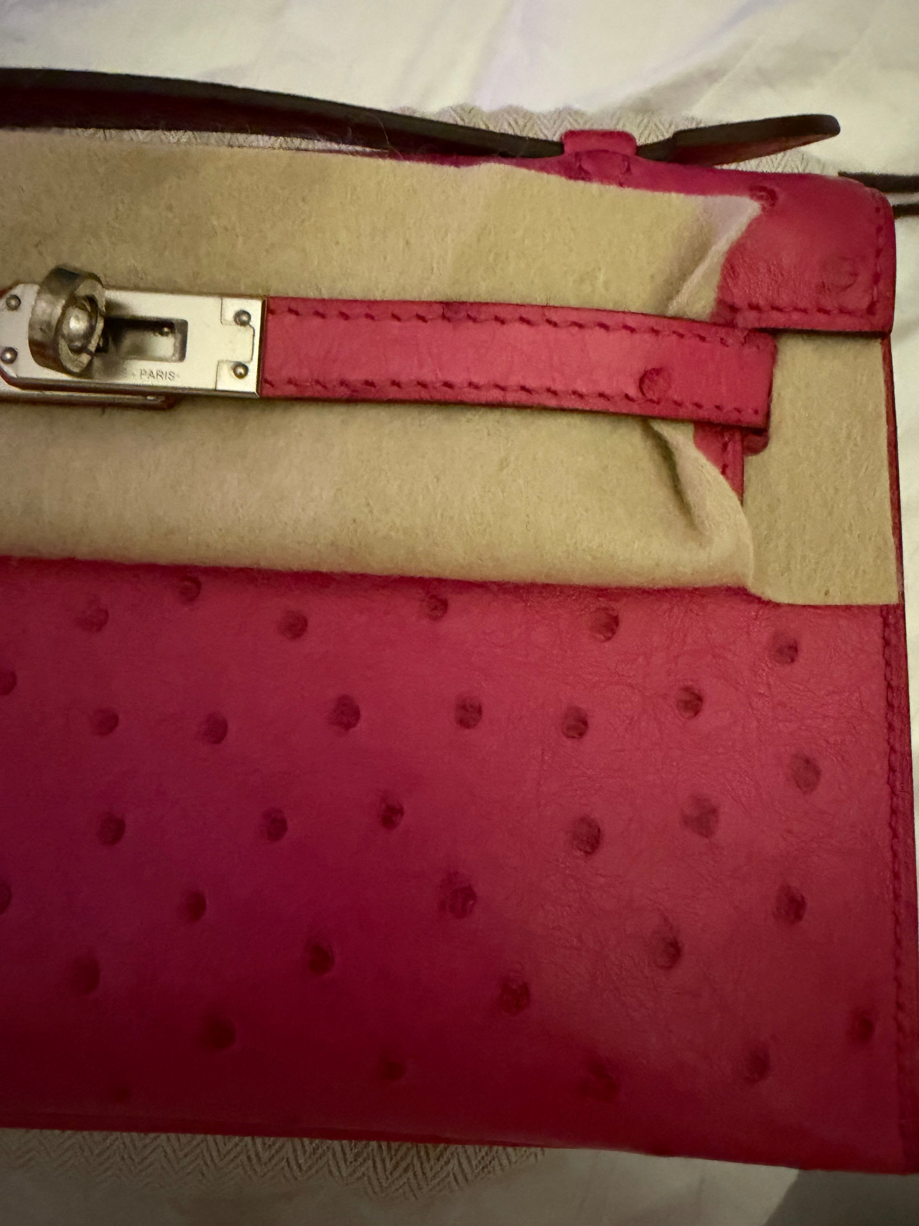 Hermes -  rose tyrien Ostrich Kelly Pochette Palladium Hardware
