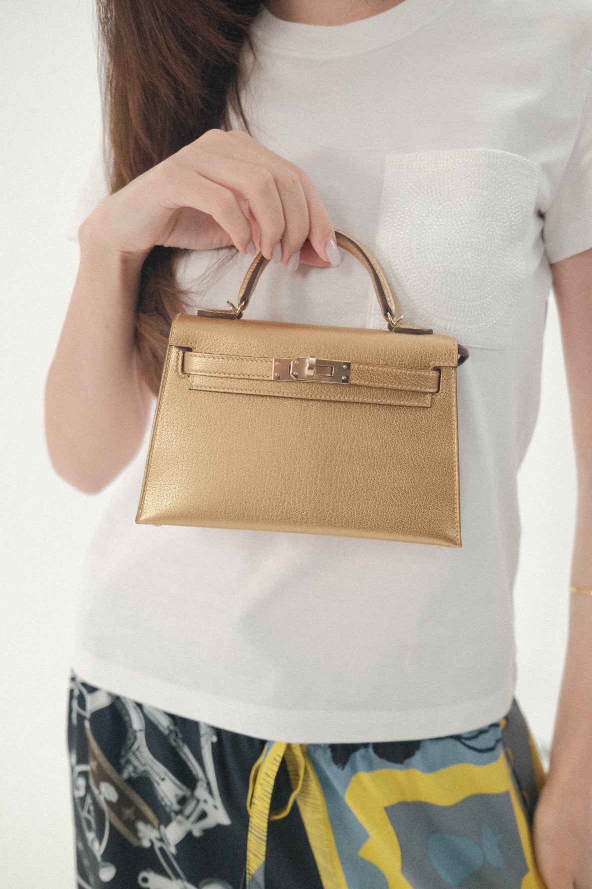 Hermes- MINI KELLY 20 DORÉ METALLIC CHÈVRE CHAMKILIGHT PERMABRASS HARDWARE
