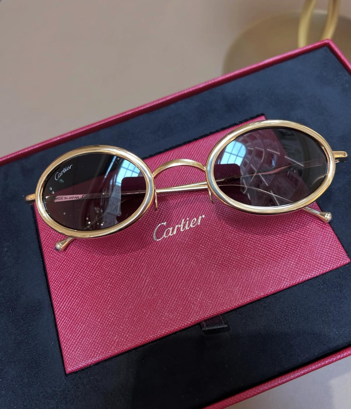 Cartier - Oval-frame gold-tone titanium sunglasses